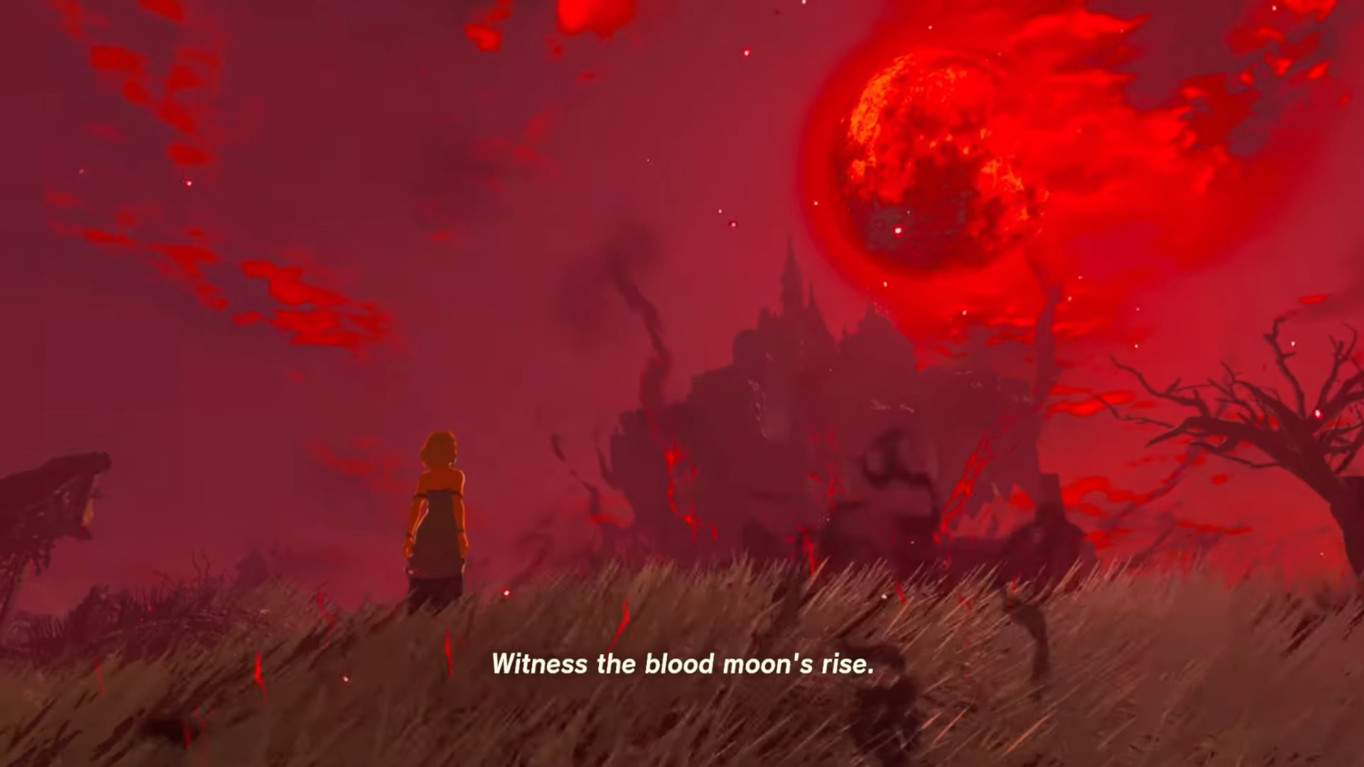 The Blood Moon shown in a red sky in The Legend of Zelda: Breath of the Wild. The text "witness the blood moon's rise" appears on the screen.