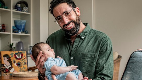 Dr Zac Seidler with his son, Artemis.