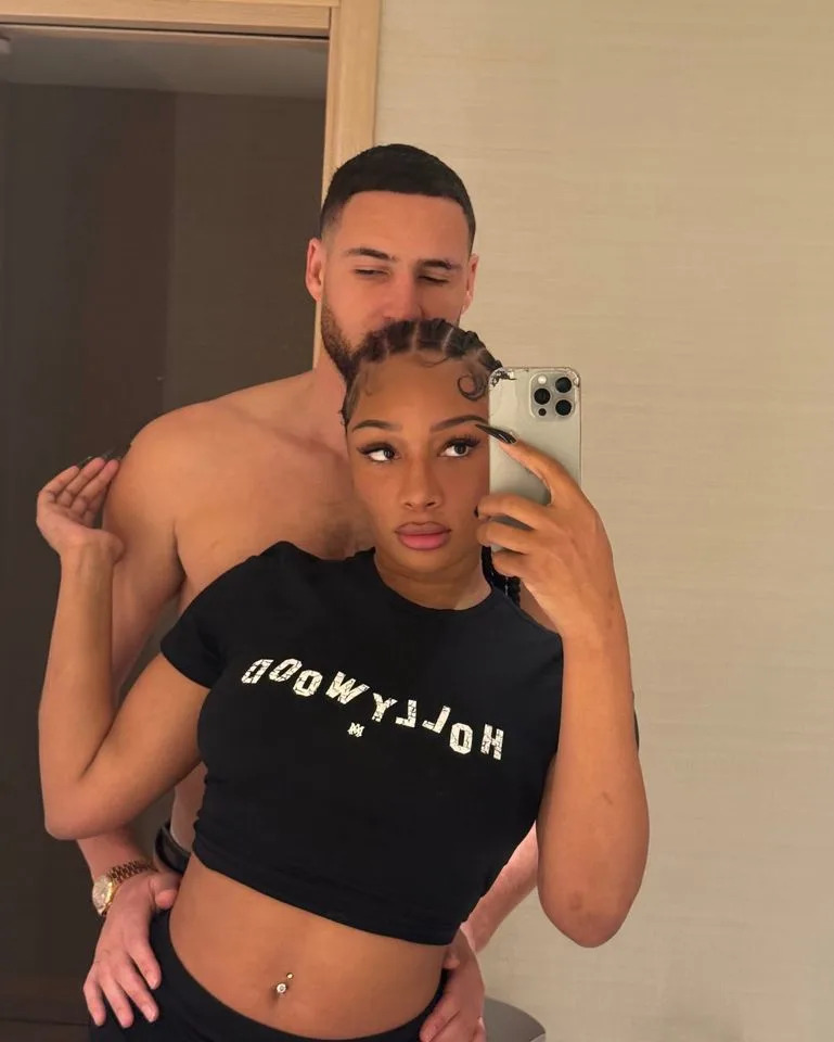 Megan Thee Stallion poses in a bathroom selfie with her boyfriend Klay Thompson on Instagram on March 26, 2026.Credit: Megan Thee Stallion/Instagram
