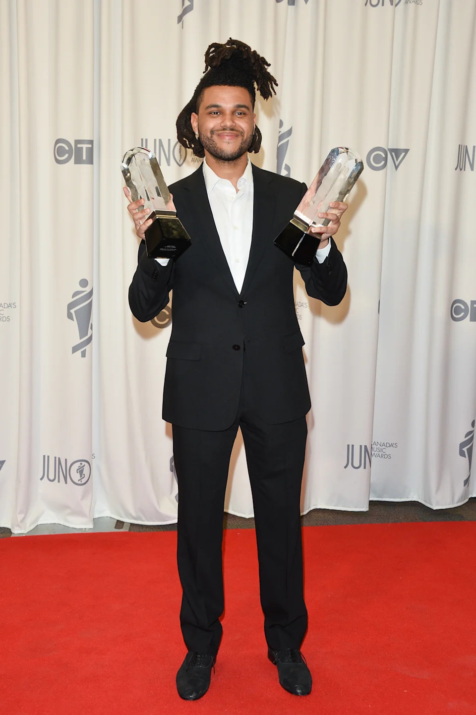 HAMILTON, ON - MARCH 15: The Weeknd poses backstage in the press room at the 2015 Juno Awards at FirstOntario Centre on March 15, 2015 in Hamilton, Canada.  (Photo by George Pimentel/WireImage)
