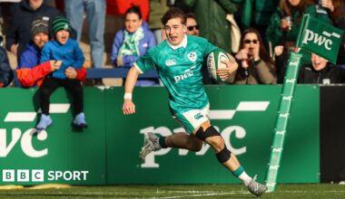 Christopher Barrett runs in his side's sixth try