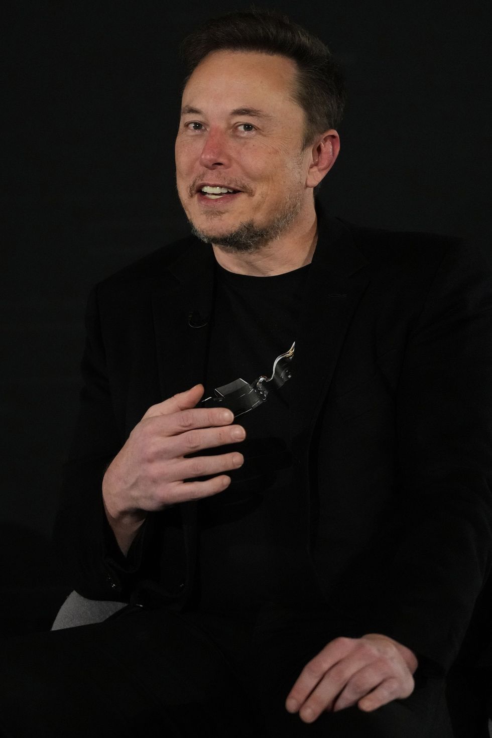 Elon Musk, who has African heritage, responded to Lewis Hamilton on X