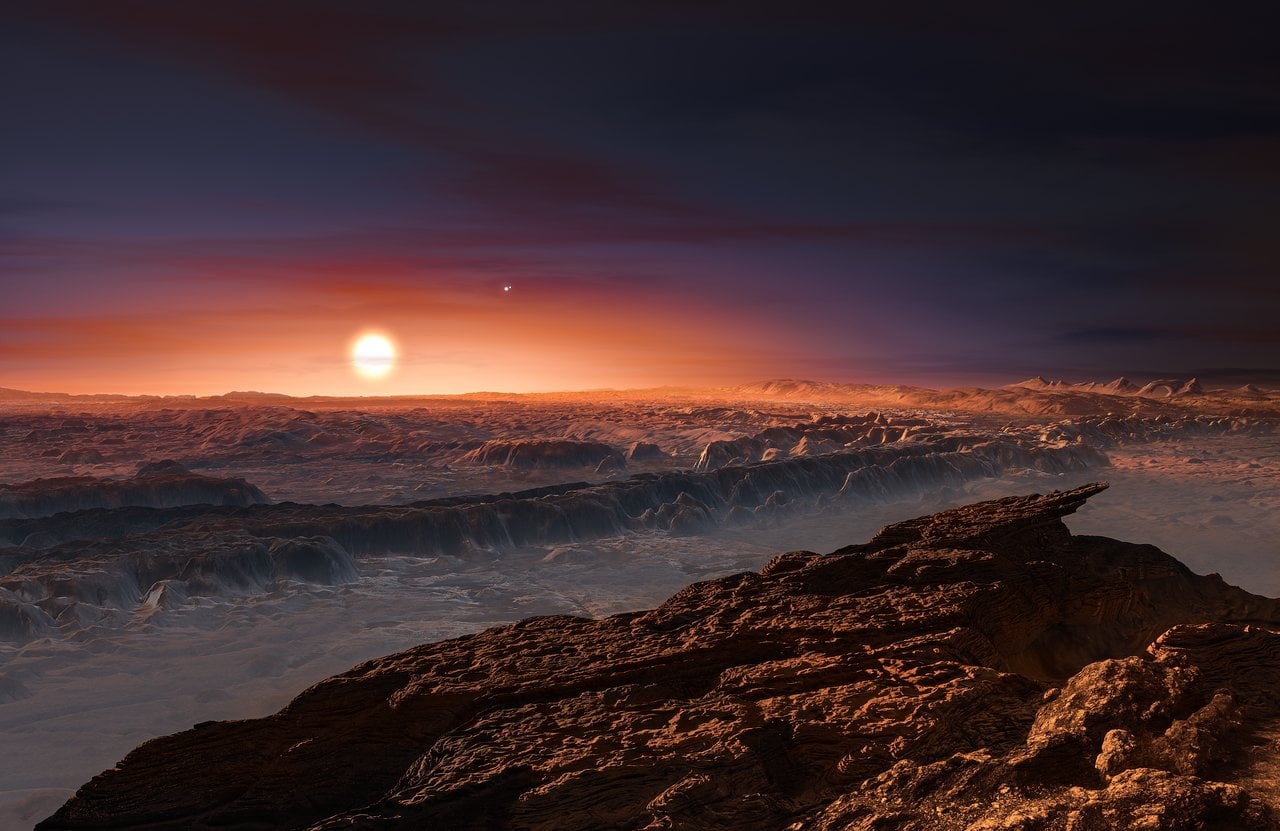 Artist's impression of the surface of a planet in the Proxima Centauri system. Credit - ESO/M. Kornmesser