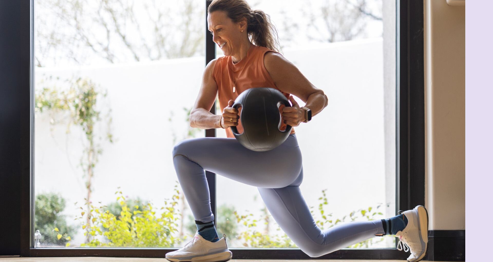 Woman doing lunge as part of a 30-minute gym workout