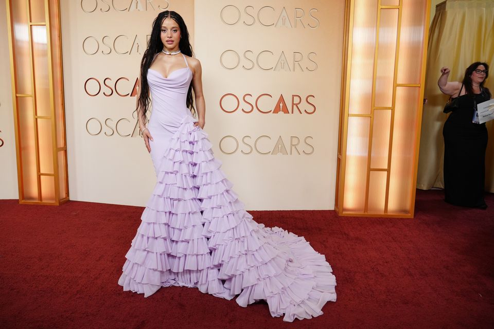 Chase Infiniti wore a pale lavender mermaid style ruffle dress by Louis Vuitton (Jordan Strauss/Invision/AP)