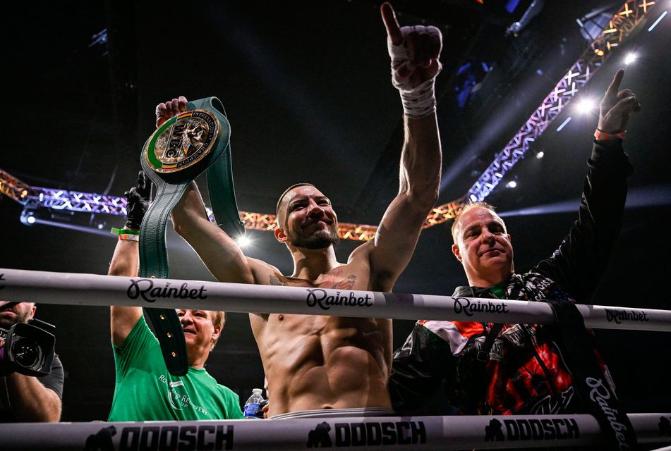 Kevin Walsh celebrates after winning the WBC featherweight title from defending champion Michael Conlan at the SSE Arena in Belfast. Photo: David Fitzgerald/Sportsfile