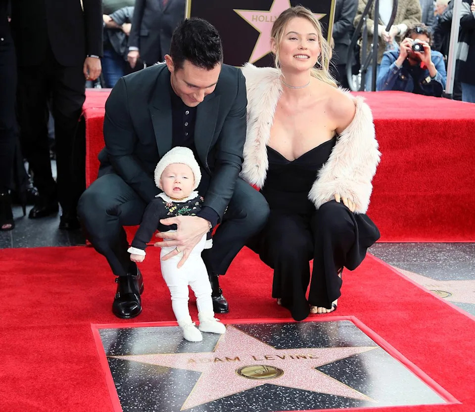 Adam Levine, Behati Prinsloo and Dusty Rose LevineCredit: David Livingston/Getty