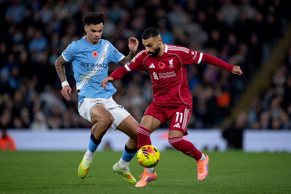 Mo Salah of Liverpool and Nico O'Reilly of Manchester City