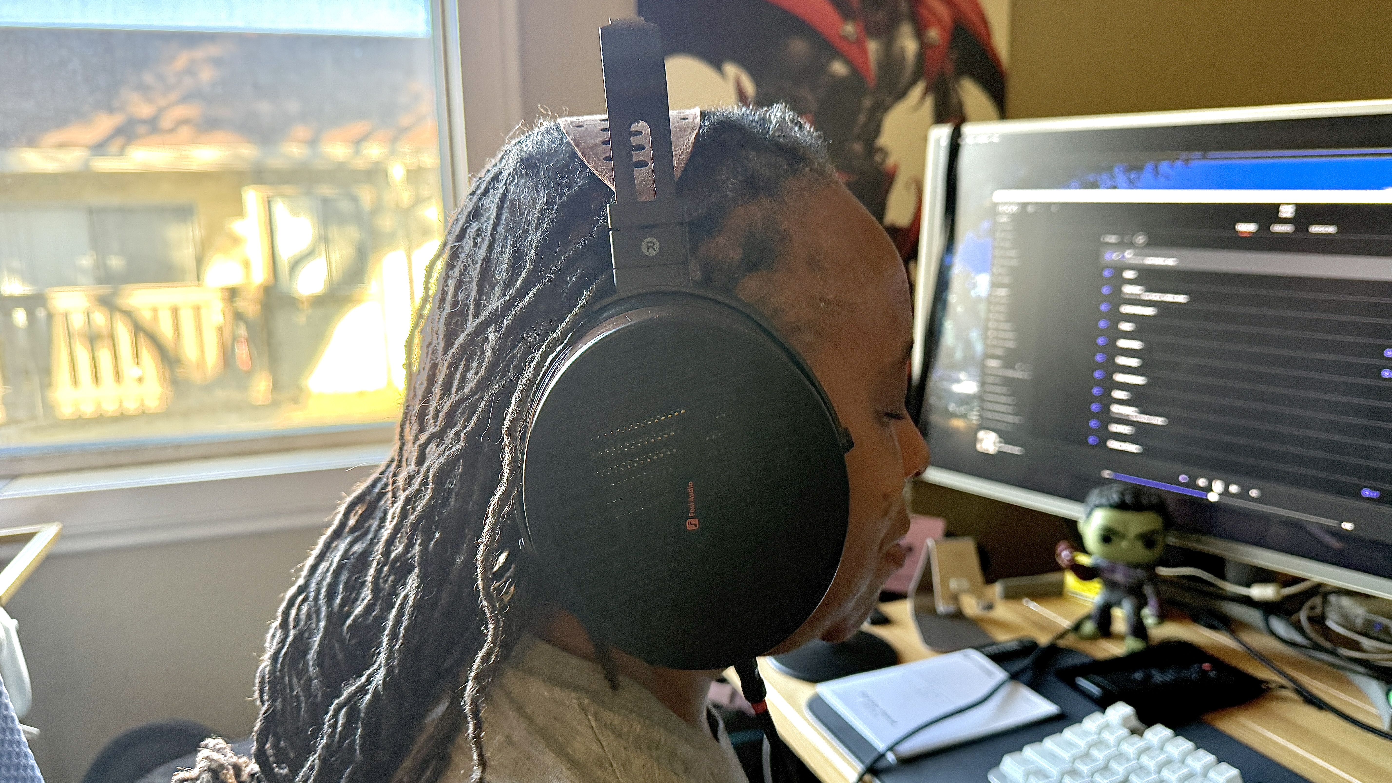 Fosi Audio i5 headphones being worn by reviewer's wife