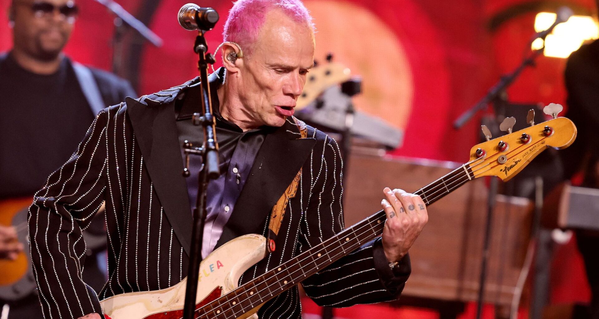 Red Hot Chili Peppers' Flea shows off head injury from "bizarre peeing accident"