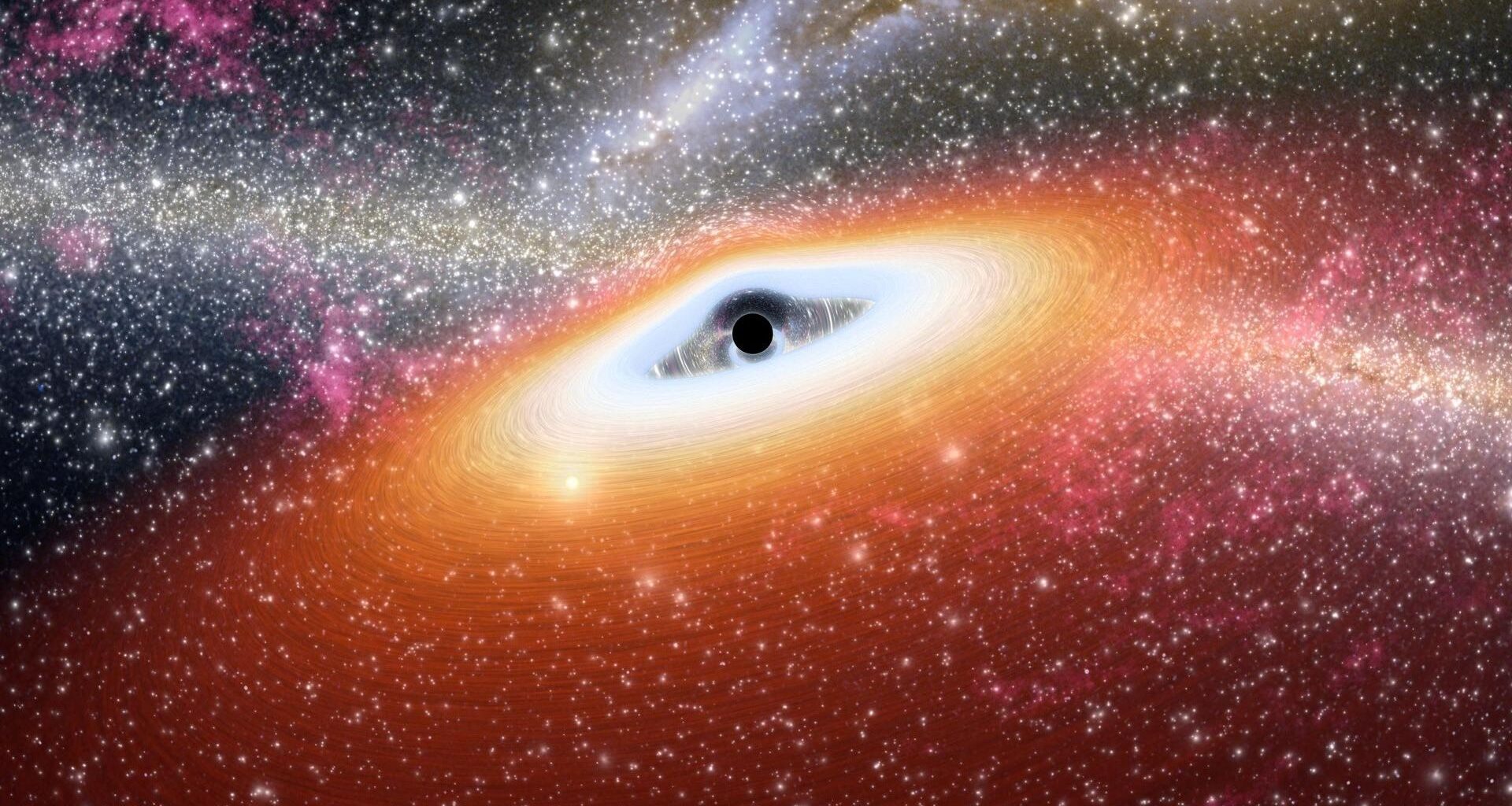 An artist's illustration of a black hole in yellow, blue and pink light
