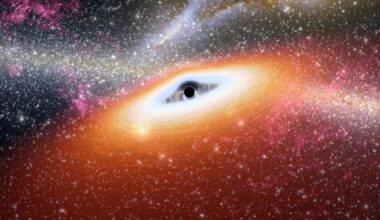 An artist's illustration of a black hole in yellow, blue and pink light