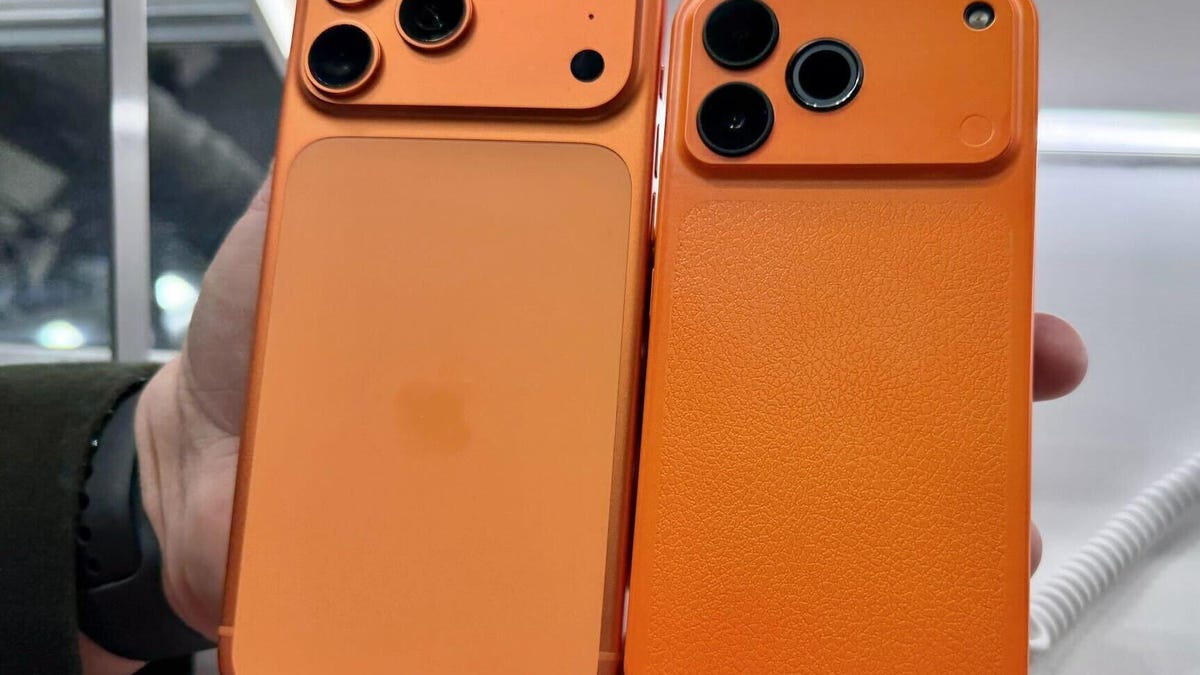 An orange iPhone 17 Pro next to an orange phone that looks like it at MWC 2026.