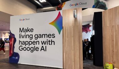 A booth on a convention floor with words listed on the side: "Make living games happen with Google AI."