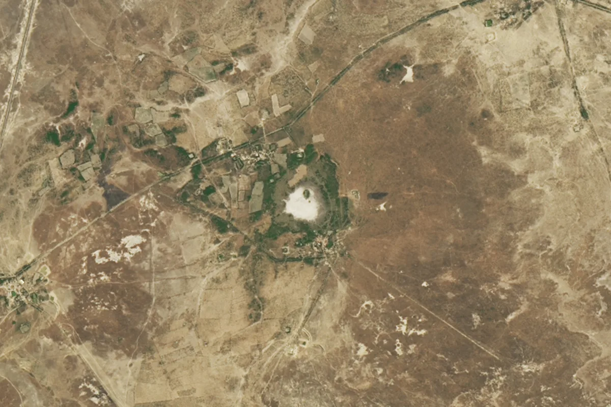 India's Luna impact crater, the white mark in the centre of the image. NASA Earth Observatory image by Michala Garrison, using Landsat data from the U.S. Geological Survey.