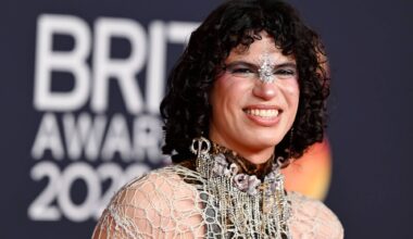 Jacob Alon raises Palestine scarf during Sharon Osbourne's speech at 2026 BRIT Awards