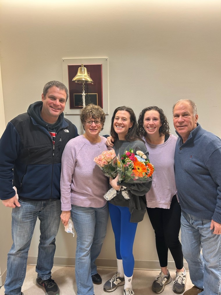Lava celebrates finishing chemo with her family.