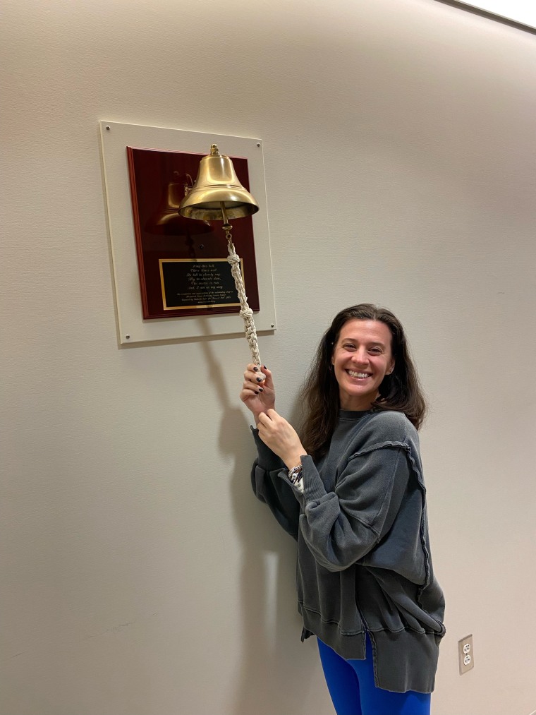 Lava ringing the bell after finishing chemo.