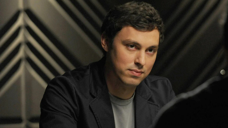 Sweets (John Francis Daley) sitting down on Bones