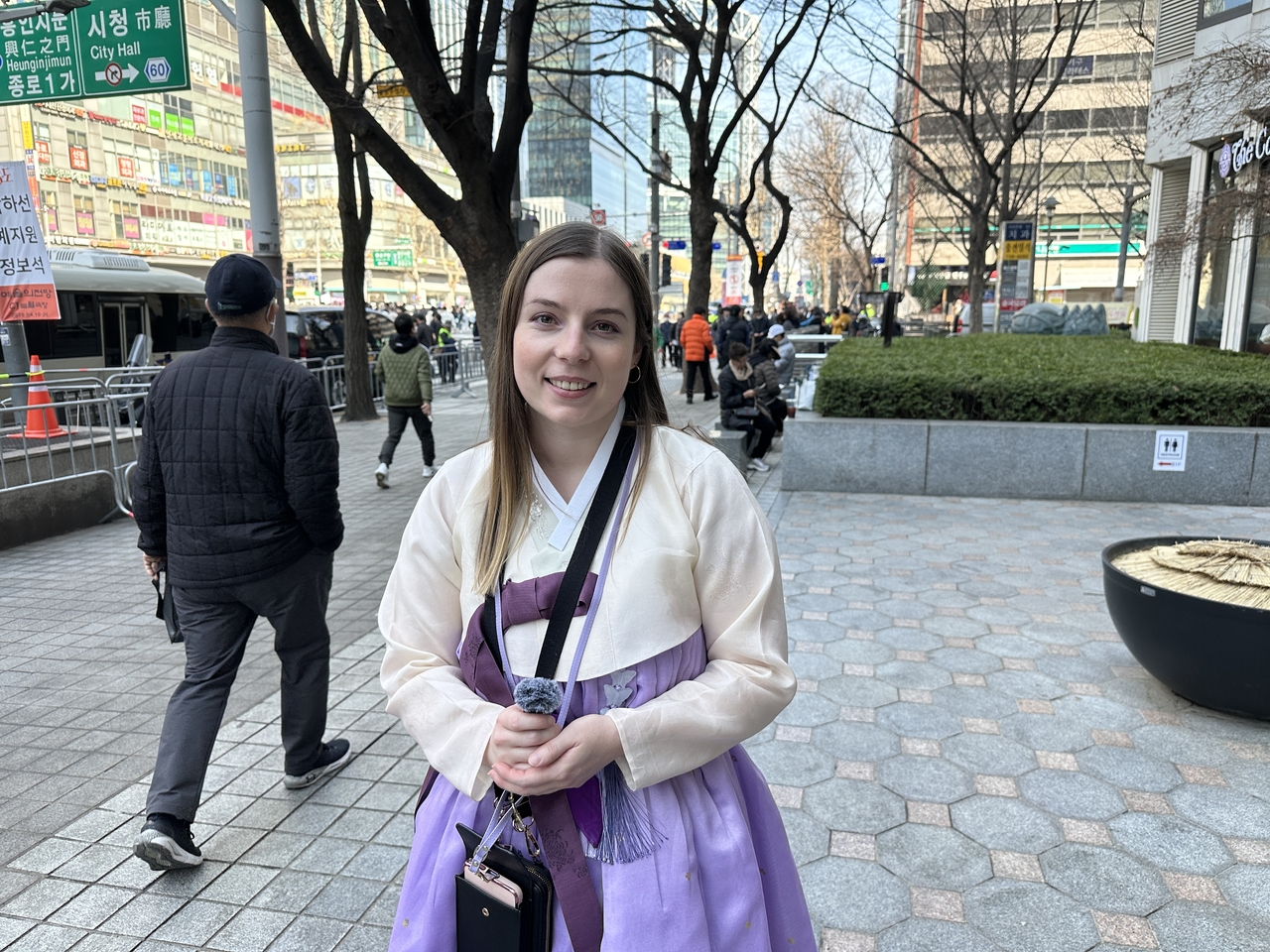 Emily Monro, Australian BTS fan, speaks to The Korea Herald in an interview ahead of BTS’ comeback show at Gwanghwamun Square in Seoul, Saturday. (Tammy Park/The Korea Herald)