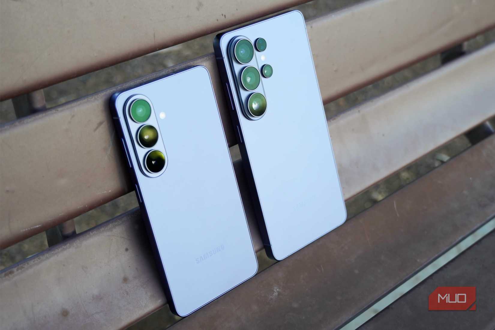 The Galaxy S26 and Galaxy S26 Ultra leaning against a park bench.