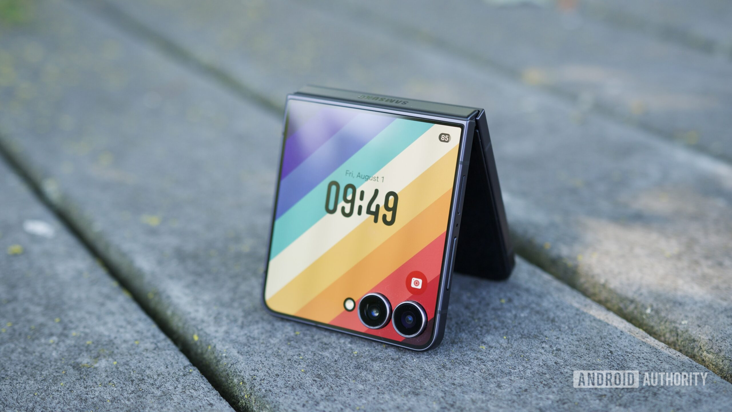 The Galaxy Z Flip 7 with its cover screen on.