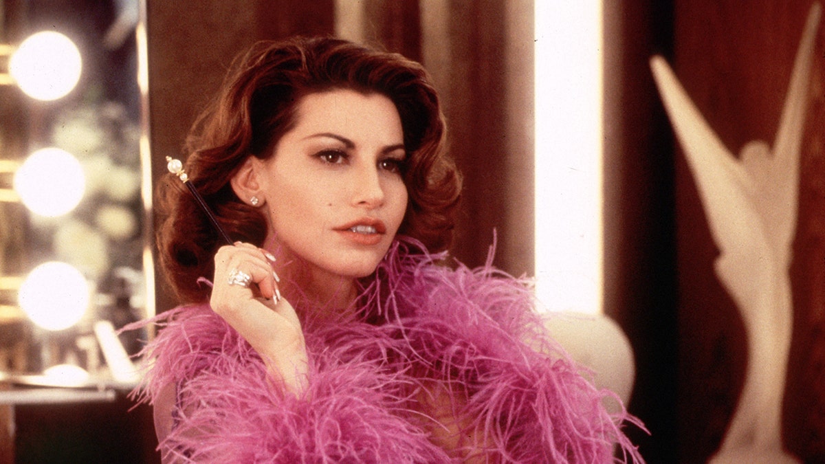 Gina Gershon looking glamorous as Gina Connors in "Showgirls."