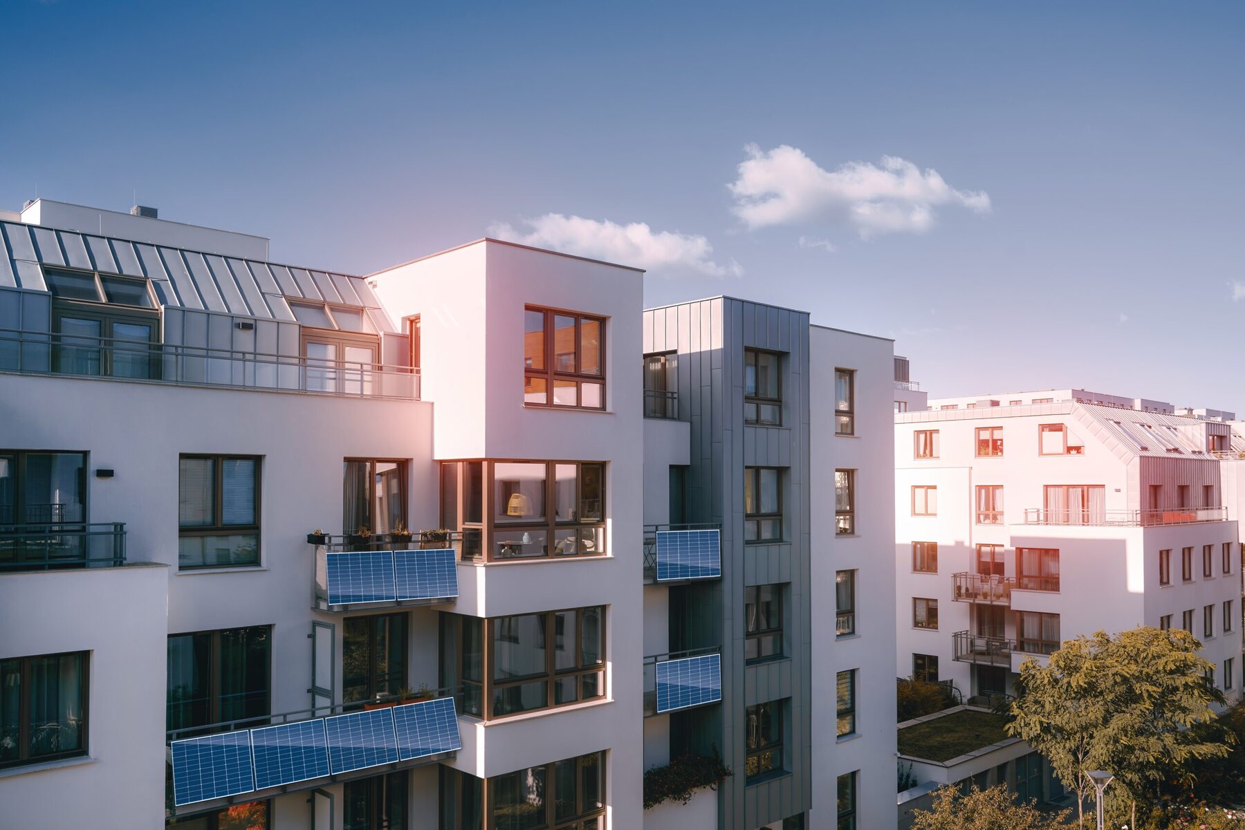 balcony solar panels across an apartment building