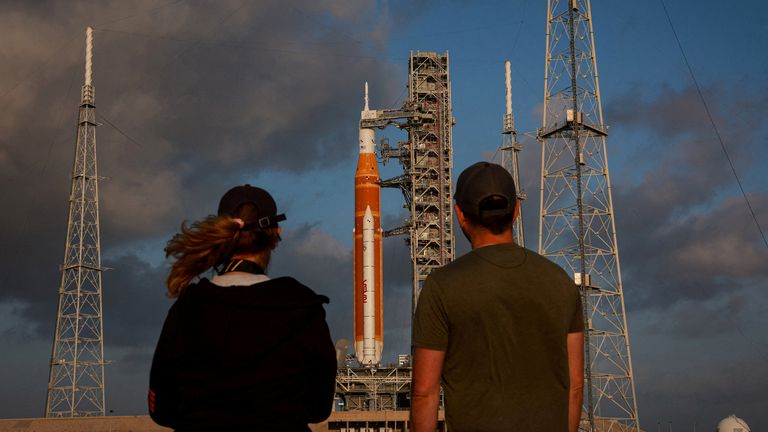 People look at NASA's next-generation moon rocket ahead of the Artemis II mission launch. Pic: Reuters