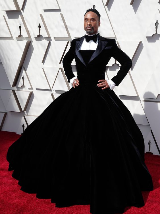 And why should women have all the fashion fun? Billy Porter wore a black velvet tuxedo dress in 2019, designed by Christian Siriano. Pic: Reuters