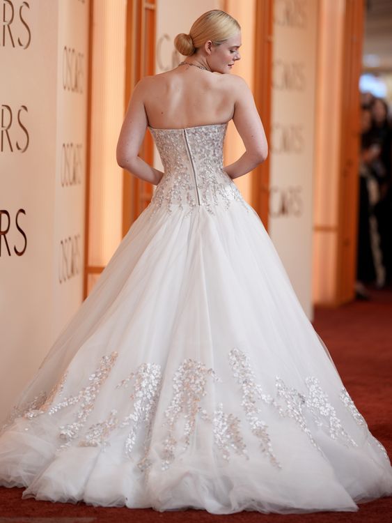Best supporting actress nominee Elle Fanning bringing strong bridal vibes. Pic: AP