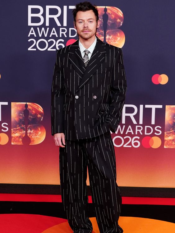 Harry Styles, looking dapper in his two-piece and spats. Pic: PA