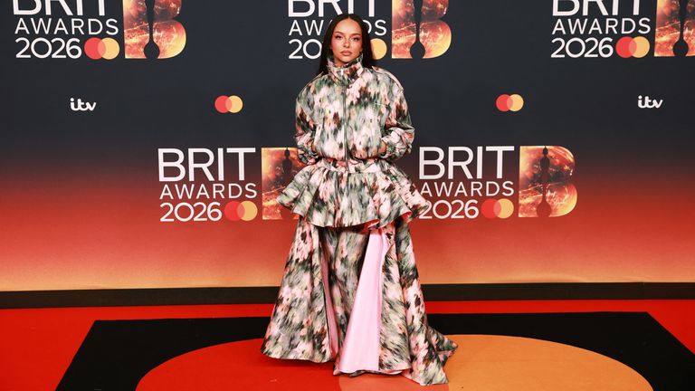 Jade Thirlwall wowing in her outfit, complete with matching  tights and shoes. Pic: PA