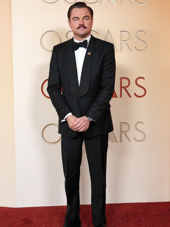 Leonardo DiCaprio - suited, booted and looking good. Pic: AP
