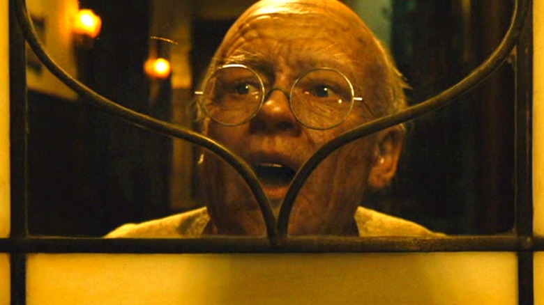 Brad Pitt as the elderly looking child Benjamin Button in The Curious Case of Benjamin Button