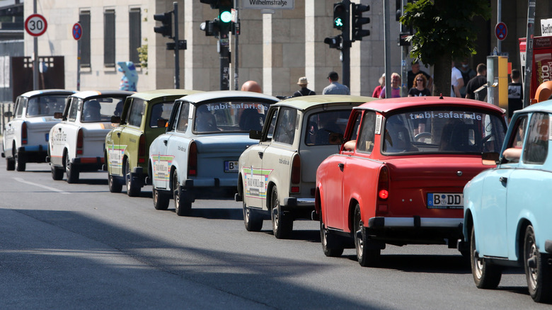 A row of classic Trabant models on a street in Berlin