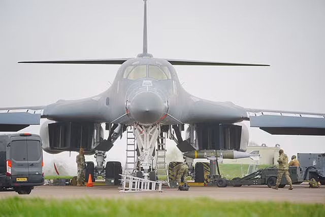 A US Air Force B-1 bomber is loaded with bombs at RAF Fairford in Gloucestershire