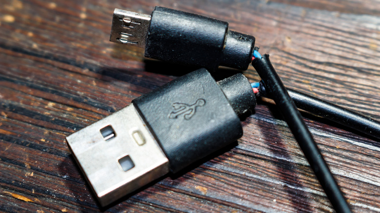 Old, frayed USB charging cables.