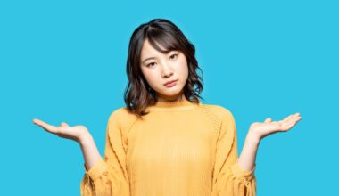 A person with their hands up in frustration.