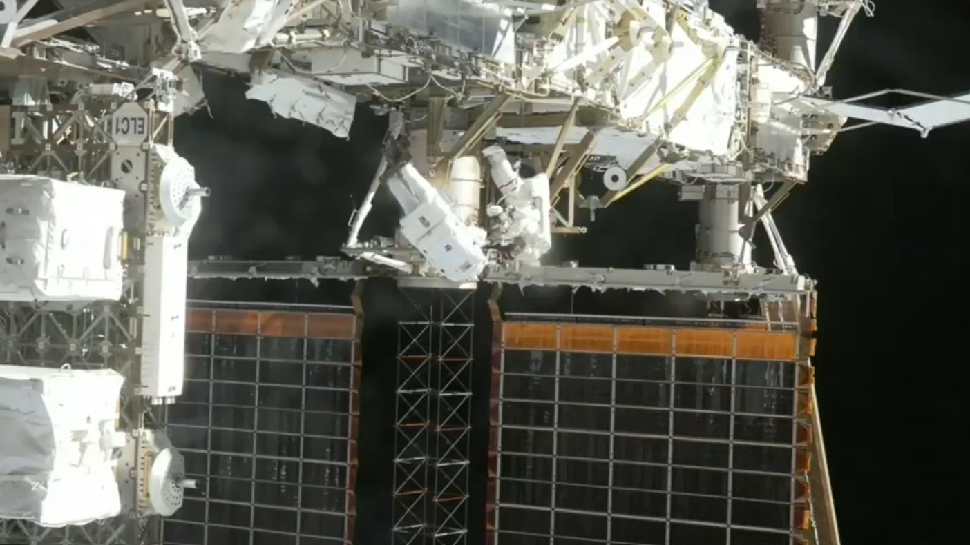 NASA astronauts Jessica Meir and Chris Williams are seen outside the International Space Station installing a solar array modification kit during U.S. EVA 94 on March 18, 2026. Credit: NASA