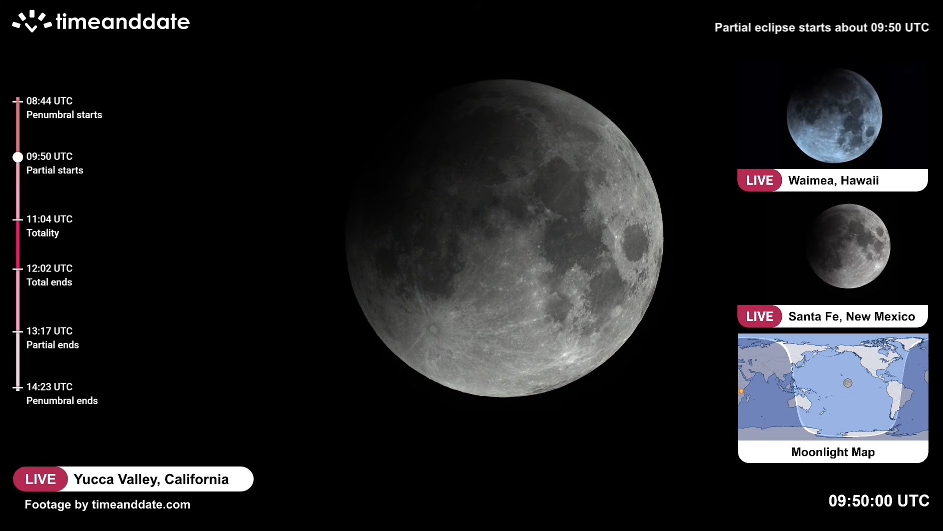 close up view of the moon with a dark patch appearing in upper left corner