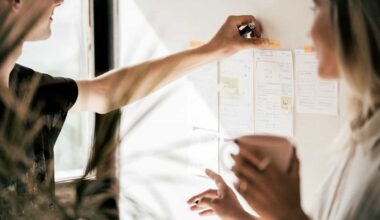 person holding white printer paper