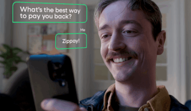 A man looking into a smartphone with text bubbles beside him that read "What's the best way to pay you back?" "Zippay".