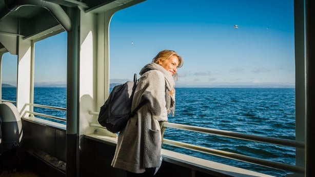 woman enjoying a boat trip