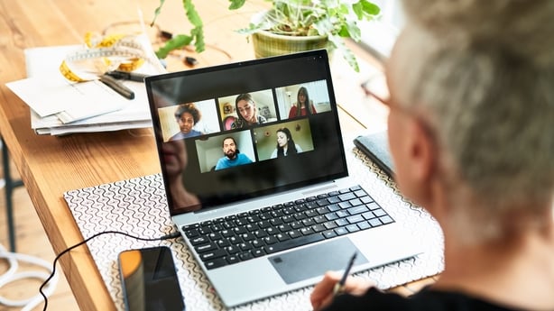 Business owner discussing ideas with colleagues on video call, communication, brainstorming
