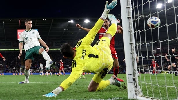 CARDIFF, WALES - MARCH 31: (EDITORS NOTE: Image Has Been Taken Using A Remote Camera.) Jamie Donley of Northern Ireland scores his team's first goal past Karl Darlow of Wales during the international friendly match between Wales and Northern Ireland at Cardiff City Stadium on March 31, 2026 in Cardi