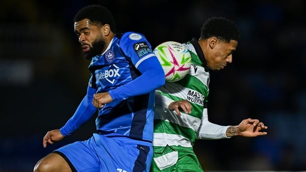 3 April 2026; Trae Bailey Coyle of Waterford in action against Maleace Asamoah of Shamrock Rovers during the SSE Airtricity Men's Premier Division match between Waterford and Shamrock Rovers at the RSC in Waterford. Photo by Seb Daly/Sportsfile