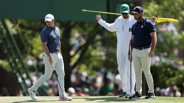 AUGUSTA, GEORGIA - APRIL 13: (R-L) Bryson DeChambeau of the United States and Rory McIlroy of Northern Ireland line up putts on the third green during the final round of the 2025 Masters Tournament at Augusta National Golf Club on April 13, 2025 in Augusta, Georgia. (Photo by Michael Reaves/Getty Im