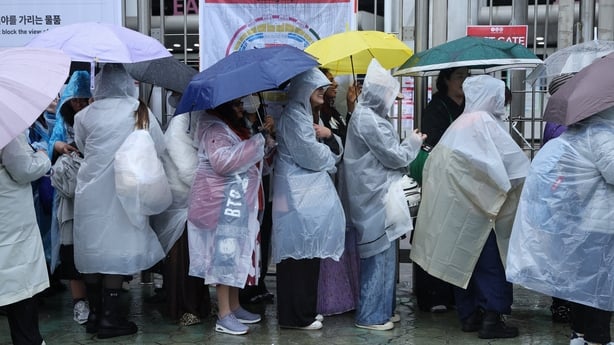  Fans of K-pop boy band BTS wait in line for the BTS World Tour 'Arirang' at Goyang stadium 