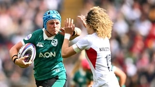 Brittany Hogan of Ireland is tackled by Ellie Kildunne of England during the Women's Six Nations Rugby Championship match between England and Ireland at Allianz Stadium in Twickenham, England.